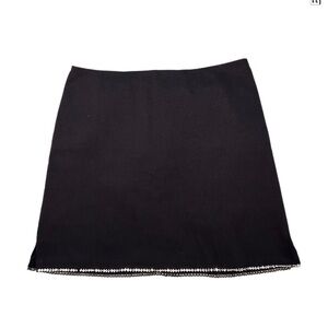 Chic Black Mini Skirt with Embellished Hem